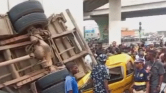 Truck Plunges Off Pen Cinema Bridge in Lagos, Driver Injured
