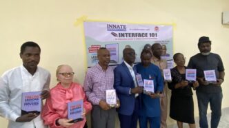 Students Receive Donated Books as Author Inspires at NIJ Career Seminar